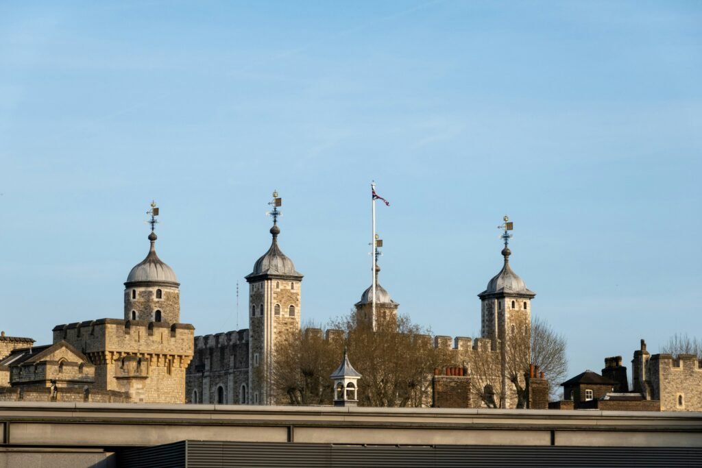 a view of a building with a clock tower in the background